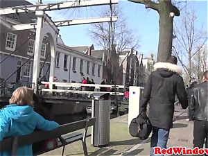 Amsterdam hooker fellates customer