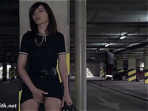 Jeny Smith uncovering her perfect figure in a parking garage